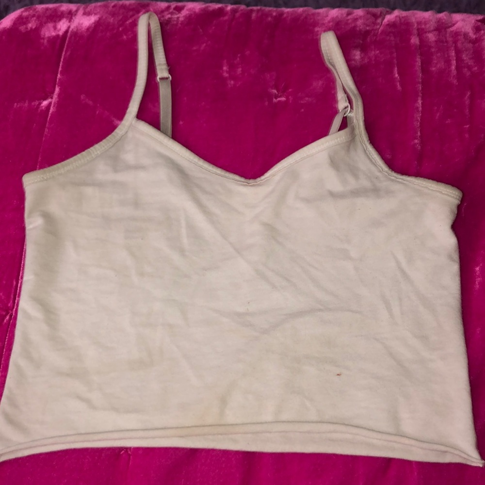Plain white tank top with adjustable straps